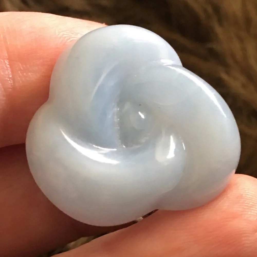 Vintage 70s light blue plastic swirl clip earrings